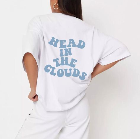 Elevate your style with our exclusive Head In The Clouds T-Shirt! Designed for fashion enthusiasts and perfect for gifting, this tee will take you to new fashion heights. 🌤️ #SkyHighFashion #FashionistaFavorite #GiftsThatSoar Cute Tshirt Designs Graphic Tees Cricut, Trending Tshirts 2023, Event Tshirt Design, Conference Merch, Aesthetic Tshirt Design Ideas, Trendy Tshirts Graphic Tees Design, T Shirt Text Design, Boyfriend Best Friend, Jeans Trend