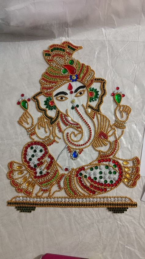 Kundan rangoli.. made by me...new 2022 Dasara Photo, Machi Work, Bird Silhouette Art, Ganesha Rangoli, God Pic, Kundan Rangoli, Venkateswara Swamy, Peacock Embroidery Designs, Sugar Beads