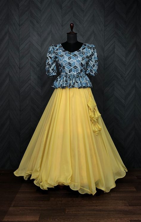 PREMIUM READYMADE PEPLUM LEHENGA CHOLI COLLECTIONS Chinnon With Position Print Top With Plain Tebby Silk Lehenga, This Combinations gives Top Trending Look For any functions or Special occasions to wear. Peplum Lehenga Choli Peplum Top Lehenga, Peplum Lehenga, Yellow Lehenga Choli, Peplum Outfits, Blue Peplum Top, Crop Top Lehenga, Peplum Crop Top, Yellow Lehenga, Peplum Skirt