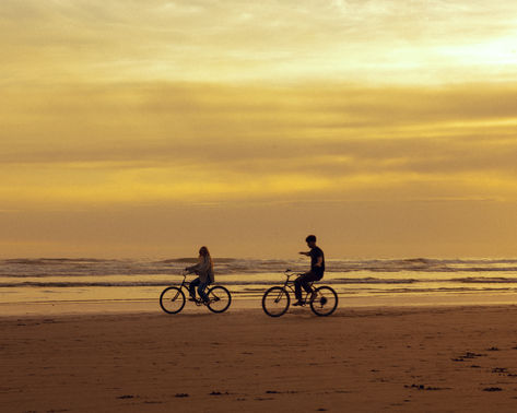 Cinematic, canon beach, Oregon, 80s rom com, vintage aesthetic, passion, twilight, Oregon coast, bikes, bike shoot, motion blur, casual outfits, screen grabs, dress, movie scenes, film, vintage, cozy, movie scenes, couples inspo, aesthetic, couples photos, in love, young, free, movie stills, cinematography, documentary style photography, storytelling, colorado photographer, couples photos, Oregon photographer, cinematic imagery, Film Scenes Cinematography, Beach Movie Aesthetic, 80s Couple Aesthetic, 80s Couples Aesthetic, Twilight Oregon, Cinematic Photography Aesthetic, Cinematography Documentary, 80s Couple, Canon Beach Oregon