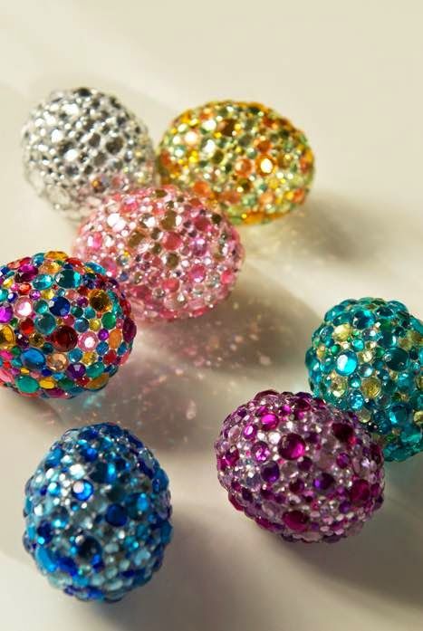 These beautiful and sparkly rhinestone covered eggs would make the perfect addition to your Easter decor! You can use wooden, plastic, or Styrofoam eggs and use either glue on or stick on rhinestones in your choice of color. https://www.craftsupplydepot.com/holiday/easter1.asp #bjcraftsupplies #craftsupplydepot #craftingisfun #craftfun #diycrafts #eastereggdecor #eastercrafts #rhinestonecrafts #decoratingeggs #blingeggs Easter Craft Projects, Creative Easter Eggs, Easter Egg Crafts, Easter Eggs Diy, Easter Projects, Egg Crafts, Spring Holidays, Easter Time, Easter Egg Decorating