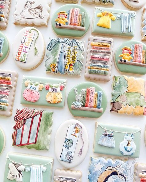 Madison Bagley on Instagram: "Full story book baby shower set! 📚 ⠀ What a fun set!! Details are always my favorite part of a set so when I started on this set I knew I wanted every cookie to be a little different. The books that my client wanted me to use were “Chica Chicka Boom Boom”, “Make Way For Ducklings”, “Goodnight Moon”, “Madeline”, “Officer Buckle & Gloria”, “Miss Spiders Tea Party” and “Rainbow Fish”. ⠀ Everything was hand painted using @americolor gels and ever clear. ⠀ Book cookie c Little Golden Books Baby Shower Theme, Storybook Baby Shower Cookies, Book Baby Shower Cookies, Madeline Baby Shower Theme, Book Themed Cookies, Story Book Cookies, Story Book Baby Shower Themes, Book Cookies Decorated, Book Sugar Cookies