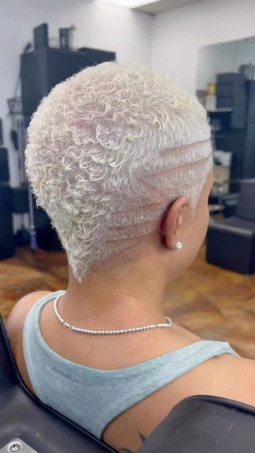 Tarik 💈 DreamCutsBarberLounge on Instagram: "✨💈 Blonde Bombshell Curly Hawk ✨ . . @dreamcutsbarberlounge @the_perfectly_imperfect5 . . #barber #barberlife #barberlove #natural #naturalhair #haircut #hairstyle #mature #sexy #fade #hair #curls #undercut #woman #women #ladies #classy #style #stylish #color #design #cut #thecutlife #fashion #beauty #instastyle #barbershop #hairshow #stylist #DreamCutsBarberLounge 💈 ." Low Blonde Haircut Black Women, Women With Fades, Women Fades With Designs, Womens Fade Haircut Short Hair, Bald Fade Women Black Design, Female Fade Haircut Black Women, Black Women Short Haircut Fade Designs, Fade Haircut Women, Short Hair Designs