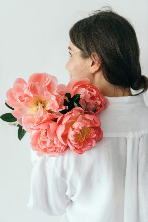 Happy woman with a bouquet of coral sunset peony | premium image by rawpixel.com / Jira Peonies Photography, Woman Holding Bouquet, Coral Sunset, Peony Illustration, Holding Bouquet, Bouquet Photography, Coral Peonies, Peonies And Hydrangeas, Flower Photoshoot