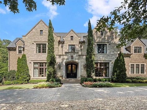 Redesigned 21,000 Sq. Ft. Buckhead Manor Relists for $9.49M in Atlanta, Georgia | Pricey Pads Buckhead Atlanta Homes, Office With Fireplace, Double Island Kitchen, Stone Mansion, Buckhead Atlanta, Train Room, Two Story Foyer, Outdoor Entertaining Spaces, Keeping Room