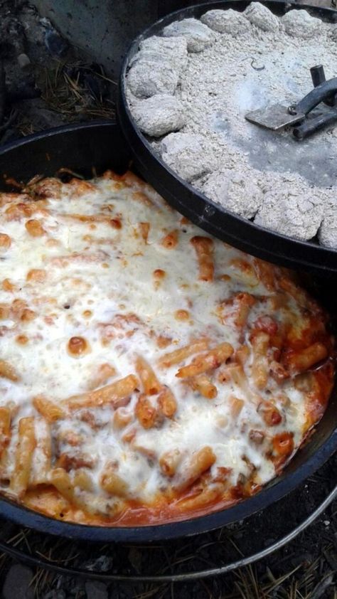 Dutch Oven Baked Ziti - My Recipe Magic #italian #dinner #maindish #easy Easy Dutch Oven Recipes, Campfire Snacks, Dutch Oven Camping Recipes, Dutch Oven Camping, Camping Dinners, Easy Camping Meals, Dutch Oven Cooking, Cast Iron Recipes, Dutch Oven Recipes