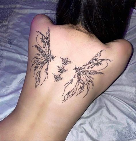 cyber gilisit tattoo style angel wings tattoo, tattoo place on back, asian model is lying on bed with back facing camera Gothic Neck Tattoo, Fairy Wing Tattoos On Back, Fairy Wing Back Tattoo, Diy Bureau, Fairy Wing Tattoos, Wing Tattoos On Back, Pretty Poison, Gothic Tattoos, Tattoos Infinity