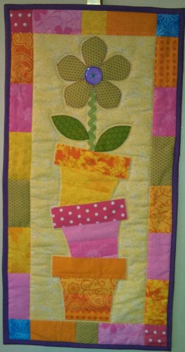 New spring wall hanging Summer Quilted Wall Hangings Patterns Free, Summer Placemats, Spring Wall Hangings Quilted, Quilted Sunflower Wall Hangings, Hanging Garden Quilt Pattern Free, Spring Wall Hanging, Flower Baskets, Holiday Banner, Quilted Table Runners Patterns