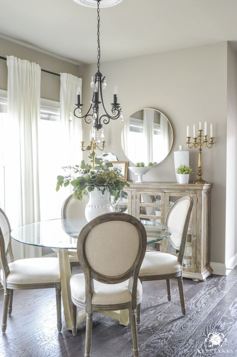 Updated Breakfast Nook- A Lighter, Brighter Look - Kelley Nan Round Brass Mirror over Buffet with Candelabras. White Ikea Ritva Curtains and Round Back Paige Dining Chairs. Perfect Greige Sherwin Williams Paint and Dark Floors Breakfast Nook Furniture, Nook Furniture, Painted Furniture Colors, Transitional House, Transitional Decor, Breakfast Nook, Spring Home, Breakfast Room, Dining Room Design