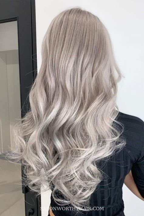 The good news is there’s a gorgeous blonde hue for everyone. So, let’s explore the full spectrum of blonde shades and help you make the perfect choice for your complexion, lifestyle, and sense of style. #BlondeHairBeauty #HairColorInspo #BeautyConfidence #BlondeAmbition #HairStyleTips Champagne Grey Hair Color, Ash Grey Hair Color Silver, Champagne Grey Hair, Ash Platinum Blonde Hair, Smokey Blonde Hair, Greyish Blonde Hair, Ash Blonde Hair With Highlights, Trendy Blonde Hair, Golden Balayage