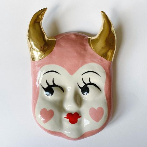 Lucy McCall on Instagram: “💗Shop is live 💗” Halloween Interior, Lucy Witch Mask, Ceramic Faces, Scary Ceramics Ideas, Horror Ceramic Art, Ceramic Moon Face, Clown Ceramic, Clown Crafts, Kitschy Decor