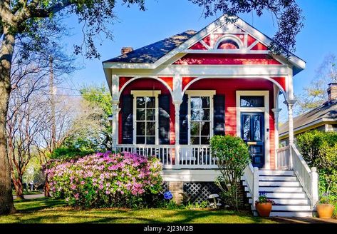 A quaint shotgun house is painted red on South Dearborn Street, March 25, 2022, in Mobile, Alabama. This home was constructed in 1989. Stock Photo Shotgun House Floor Plans, New Orleans Shotgun House, Shotgun House Interior, Magnolia Promenade, Shotgun House Plans, New Orleans Architecture, Sims Inspiration, Shotgun House, New Orleans Homes