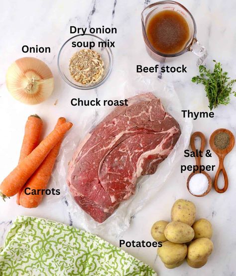 This ultimate Crock-Pot Pot Roast with Onion Soup Mix is a classic pot roast recipe made even better! Featuring a beef chuck roast topped with dry onion soup mix, then cooked low and slow in a slow cooker surrounded by potatoes, carrots, and onions, it makes a delicious dinner the whole family will love. Ranch Packet Pot Roast, Roast Potatoes And Carrots Crockpot Onion Soup, Au Jus Roast Crockpot, Roast In Crockpot Recipe Easy, Beef Round Top Round Roast Crock Pot, Pot Roast Onion Soup Mix Crock, Pot Roast Cream Of Mushroom Soup, Simple Pot Roast Crock Pot Recipes, Chuck Roast With Potatoes And Carrots