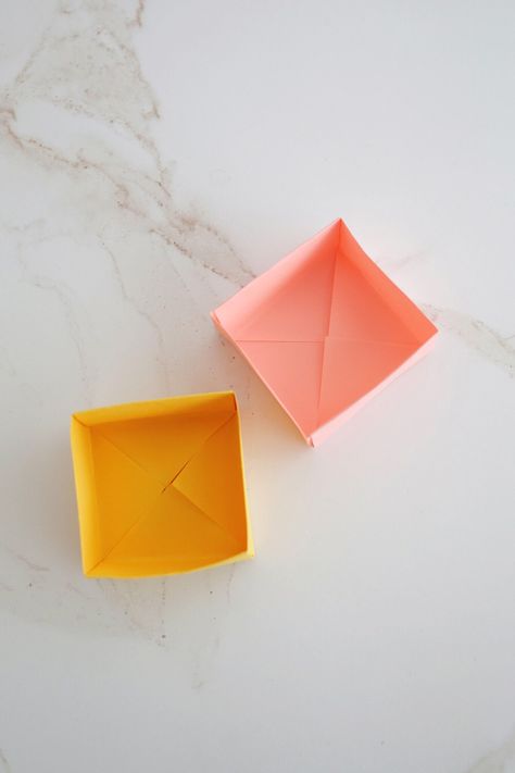 How to Make an Origami Box (with video!) - Childhood Magic How To Make A Small Box From Cardstock, Tiny Paper Boxes Diy, Origami Paper Box Tutorial, Paper Boxes Diy Folded Easy, Diy Paper Boxes Easy, Paper Boxes Diy Folded, Paper Box Origami, Origami Box With Lid, Origami Box Easy