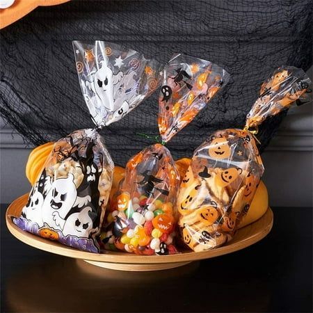 Value Sets:150 pcs cookie bags and 300 pcs ties are invluded in one set.Each bag measures 10.8 x 4.9 inch,great capacity for holding . Wide Application:Those bags are suitable for holding ,cookies,doughnuts,chocolates,popcorns,and small gifts;great for Halloween party decorations,favors and supplies. Premium Material:The bags are made of high quality oriented polypropylene (OPP) material,sturdy and for repeate use. The product includes 1 * 3pc ca[Collection] Halloween Paper Bags, Halloween Candy Box, Halloween Party Bags, Imprimibles Halloween, Halloween Teacher Gifts, Halloween Gift Bags, Plastic Gift Bags, Halloween Party Decorations, Halloween Candy Bags