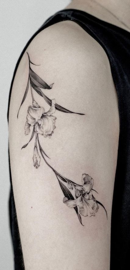 Iris Flower Tattoo Ankle, Iris Flower Fine Line Tattoo, Black And Grey Iris Tattoo, Iris Vine Tattoo, Iris Hip Tattoo, Artsy Flower Tattoos, White Iris Tattoo, Wild Iris Tattoo, Iris Hand Tattoo