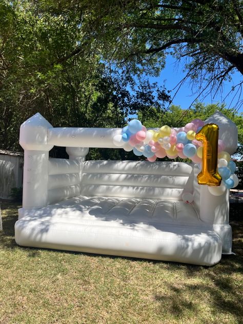 Toddler bounce house How To Decorate A Bounce House, Bounce House Decor, Balloons On White Bounce House, Modern White Bounce House, White Bounce House Birthday, White Bounce House With Balloons, Toddler Bounce House, Blue Bounce House, Moon Bounce