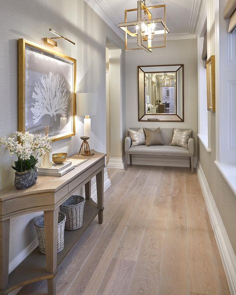 We went for a light palette with touches of gold in this entrance hall. I particularly love the limed oak floor that we had refinished. #entrancehall #hall #chandelier #lighting #art #rusticchic #sophiepatersoninteriors #luxuryhomes Sophie Paterson Interiors, Entrance Hall Decor, Sophie Paterson, Hall Flooring, Corridor Design, Hallway Designs, Hallway Design, Hall Decor, Hard Wood