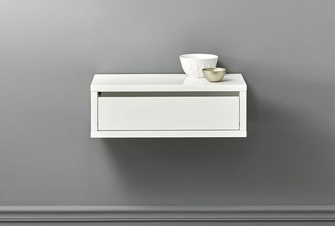 CB2’s Slice White Wall-Mounted Storage Shelf has a drawer integrated into its high-gloss lacquered wood frame; $169. It’s also available in Gray for the same price and in a Mirror surface for $269. Organized Bathroom, Wall Mounted Storage Shelves, Black Floating Shelves, Bedside Shelf, Wall Mounted Storage, Modern Storage Cabinet, Прикроватные Тумбочки, Leather Headboard, Eclectic Bedroom