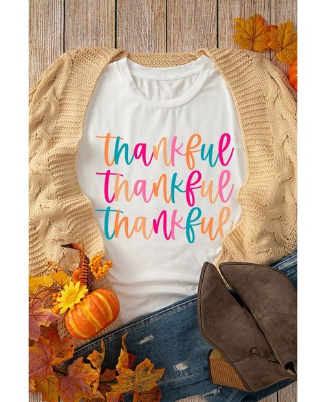 🦃✨ Spread gratitude in style this Thanksgiving with our stunning White Thankful Print Graphic T-Shirt! 🍂💕 Perfect for gathering around the table or cozying up for a family feast, this shirt is a celebration of thankfulness. Grab yours for just $27.99 and wear your heart on your sleeve! 🙌👕#ThanksgivingVibes #GratefulHeart #ThankfulTee #FallFashion #ThanksgivingStyle #FestiveWear #CozyChic #Thanksgiving2023 #ShopLocal #ExpressYourself Thanksgiving Sweater, Thanksgiving Tee, Family Feast, Crewneck Style, Casual Bottoms, Crewneck Design, White Crew Neck, Thanksgiving Shirts, Print Graphic