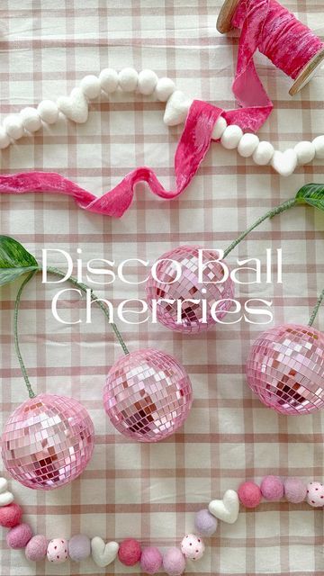 Aurelie Erikson holiday inspo + diy on Instagram: "DIY Disco ball Cherries 🍒🪩💗 I saw these pop up in an ad and knew I had to try and make them. 🍒 I promise you this is a DIY anyone can do, all you need is… * 4-inch disco balls 🪩 (any size will work) * stem wire * yarn or ribbon * large faux leafs * hot glue I can’t wait to see all your disco cherries 🍒🪩 SHARE & SAVE with your disco ball-loving besties 🪩💕 . . . . . . . . . #diytutorial #diycrafts #valentinedecor #discoball #partydecor #c Disco Ball Earrings Diy, Disco Ball Valentines, Disco Tile Diy, Diy Disco Ball Decor, Disco Valentines Day, Disco Valentine, Disco Diy, Disco Ball Cherries, Aurelie Erikson