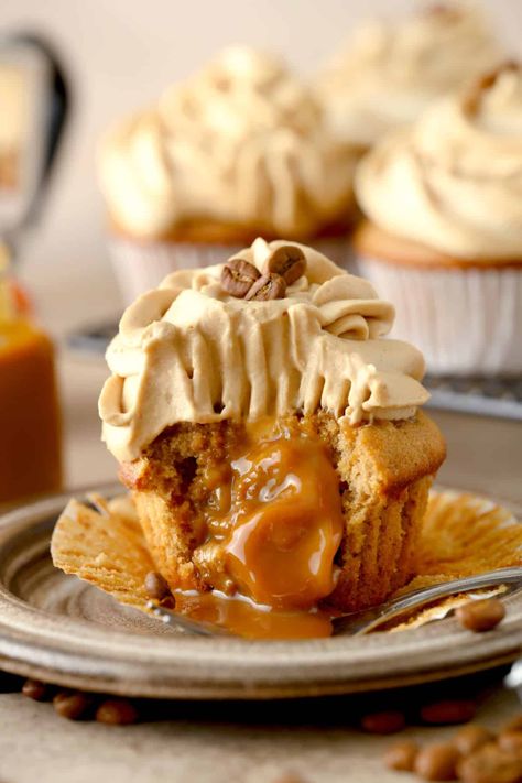 Coffee Cupcakes with Caramel Filling are at the top of the cupcake world for deliciousness. Light coffee-flavored cupcakes have an ooey gooey center and a light-as-air whipped cream icing. Perfect for any time of the day. Cupcakes With Caramel Filling, Cupcakes With Caramel, Homemade Cupcake Recipes, Whipped Cream Icing, Coffee Caramel, Caramel Filling, Coffee Cupcakes, Cream Icing, Gourmet Cupcakes