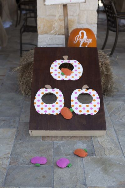 Harvest Festival Ideas For Preschool, Fall Bean Bag Toss, Harvest Party Preschool, Pumpkin Bean Bag Toss, Pumpkin Patch Ideas Festivals, Pumpkin Chuckin, Pumpkin Patch Ideas, Fall Birthday Party Ideas, Pumpkin Patch Birthday Party