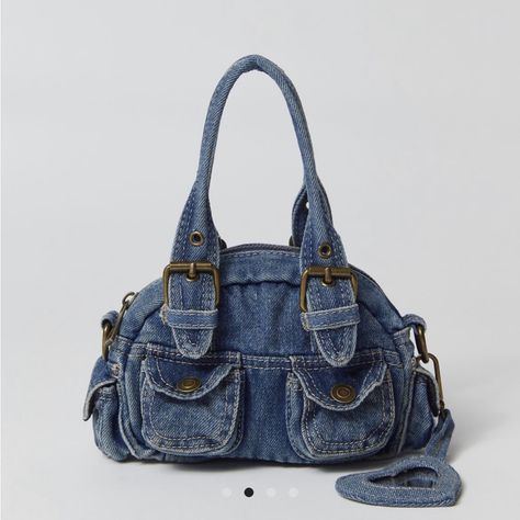 Content + Care - 100% Cotton - Spot Clean - Imported Size - Dimensions: 8.26"| 2.75"W 4.33"H - Strap Drop: 3.93" Denim Duffle Bag, Denim Shoulder Bag With Double Handle, 90s Purses, Denim Blue Shoulder Bag For On-the-go, Distressed Denim Blue Shoulder Bag, Y2k Bags, Jean Purse, Denim Crossbody, On-the-go Denim Shoulder Bag With Zipper Pocket