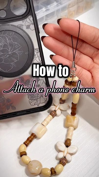 Add a charm to your phone! #phonecharm #phoneaccessories #phonestrap #beads #beadedjewelery #diy How To Put Phone Charms On Your Phone, How To Put Phone Charms, Mobile Charms Diy, Phone Case Charms Diy, Beaded Phone Charms Diy, Phone Bead Charm Diy, Phone Keychain Diy, How To Make Phone Charms, Diy Phone Accessories