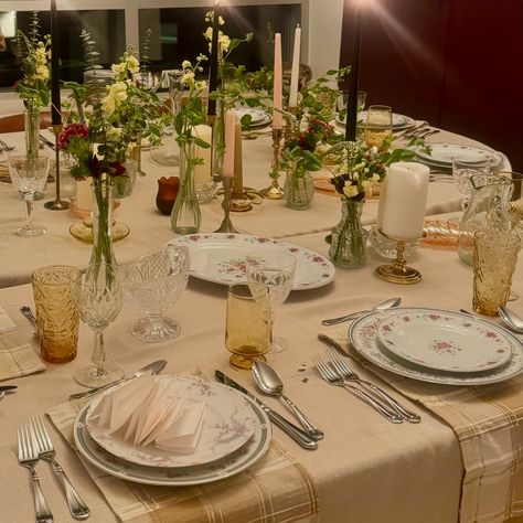 Intimate gatherings deserve thoughtful details ✨ Some views from With Love’s first Thanksgiving tablescape rental 🦃 I sourced mismatched China, assorted amber tumbler glasses and brass candlestick holders, made simple bud vase arrangements with fresh fall florals, and brought over some extra chairs to bring this table for 12 to life 🍂🕯️ Have a dinner party or special occasion you want help styling? Let’s chat 💌 #tablescape #tablescapes #tabledecor #tablesetting #eventstyling #eventrentals ... Simple Bud Vase, Bud Vase Arrangements, Bud Vases Arrangements, Table For 12, Mismatched China, Thanksgiving Tablescape, Long Dining Table, Fall Florals, Brass Candlestick