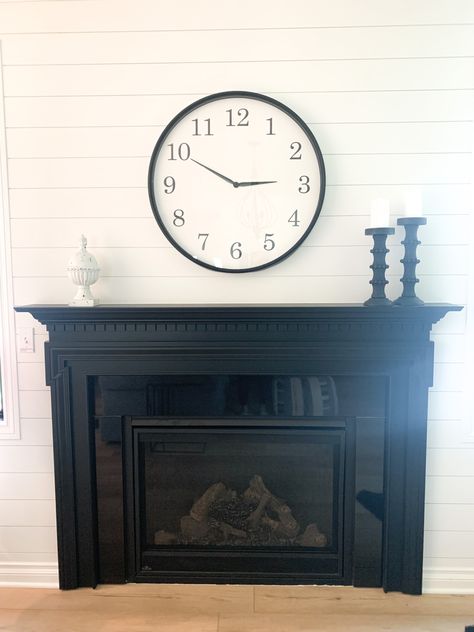 Black mantle, white shiplap wall, farmhouse Black Fireplace White Shiplap, Charcoal Gray Shiplap Fireplace, Black Shiplap Electric Fireplace Wall With Tv, Black Diagonal Shiplap Wall, Electric Fireplace Insert Shiplap, Farmhouse Black Wall Clock, Black Mantle Fireplace, Fireplace White, Black Mantle