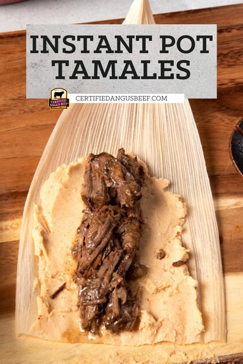 Beef tamales open on a wooden board Insta Pot Tamales Recipe, Instant Pot Tamales Cook Time, Tamales Recipe Instant Pot, Beef Tamales Recipe Homemade, Tamales Recipe Beef, Instapot Tamales, Tamales In Instant Pot, Tamales Instant Pot, Beef Tamales Recipe