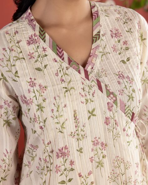 Summer 2024 - New Arrivals! Our Cream Botanical Angarkha displays elegant sprays of pink botanicals on a textured dobby fabric. The classic shade of cream, with neatly tucked pleats and a dainty tie string, tick all the boxes of an ideal summer kurta. [ Cottons Jaipur, Cotton, Floral, Botanical floral, Handmade Kurtas, Everyday-wear, Summer staples ] #cottons #cottonsjaipur #newarrivals #floral #summer #summer2024 #handcraftedkurtas #comfortfits #cottonsuitset #summertime #summerstaples #... Cottons Jaipur, Floral Kurti, Dobby Fabric, Designer Dresses Casual, Silk Suit, Boutique Stores, Print Style, Simple Doodles, Summer Staples