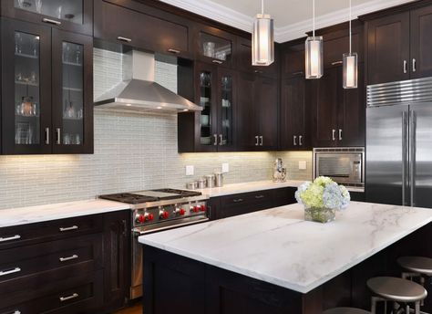 Love the look of the range hood in this kitchen. Great choice! www.rangehoodsinc.com Kitchen With Dark Wood Cabinets, Kitchen With Dark Cabinets, Walnut Kitchen Cabinets, Backsplash With Dark Cabinets, Espresso Kitchen Cabinets, Espresso Cabinets, Espresso Kitchen, Walnut Kitchen, Dark Wood Cabinets