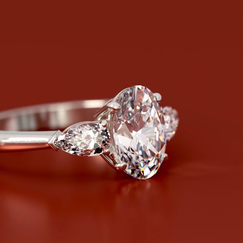 When it comes to three-stone engagement rings, the oval with pear accents has been one of our most sought after - so of course it made the cut for our new core collection ♥️ fully customisable for your preference Pricing starts from (for 0.7ct oval centre, all incl GST): - Natural diamond: $8,100 - Lab grown diamond: $3,960 - Moissanite: $2,800 #engagementring #engagementringdesign #customengagementring #threestoneengagementring #nz #aus #ovalengagementring Three Stone Engagement Rings, Engagement Rings Oval, Stone Engagement, Designer Engagement Rings, Custom Engagement Ring, Three Stone, Lab Grown, Lab Grown Diamonds, Natural Diamonds