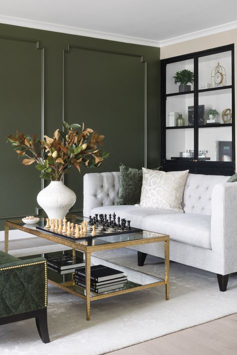 Living room, Benjamin Moore’s Chimichurri paint and custom shelf system Chimichurri Paint, Benjamin Moore Chimichurri, Nature Inspired Paint Colors, Best Neutral Paint Colors, Bold Paint Colors, Brown Rooms, Home Design Magazines, Hgtv Dream Home, Neutral Paint Colors