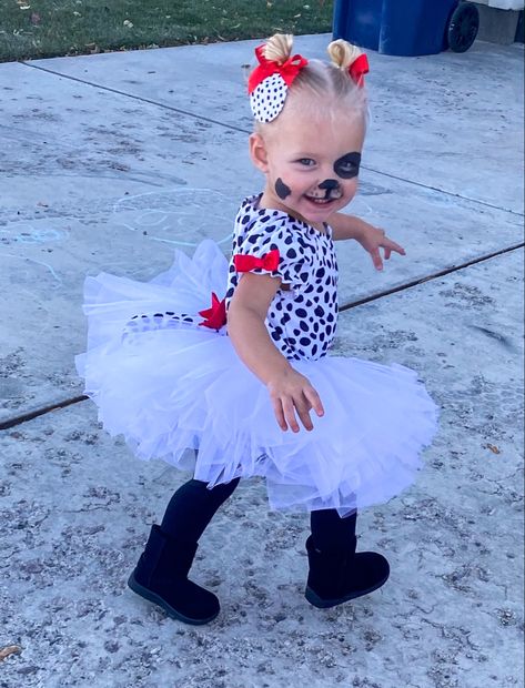 Baby girl or toddler Dalamation Halloween Costume with black leggings and boots, pigtails, and homemade dog ears/bows. Simple makeup with a little nose and a couple spots. 16 Month Old Halloween Costume Girl, Diy Puppy Ears, Baby Dalmation Costume Diy, Toddler Dalmation Costume Girl, Cute Toddler Costumes Girl, Baby Costumes Girl Diy, Toddler Puppy Costume Diy, Toddler Girl Diy Halloween Costume, Toddler Girl Halloween Costume Diy