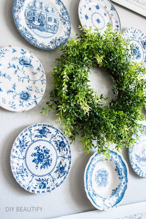 Blue And White Plate Wall Display, Plate Wreath Diy, Hanging Plates On The Wall Ideas, Blue And White Plates On Wall, Plate Wreaths, Hang Plates On Wall, Plate Wreath, Plates Display, Spring Wreath Tutorial