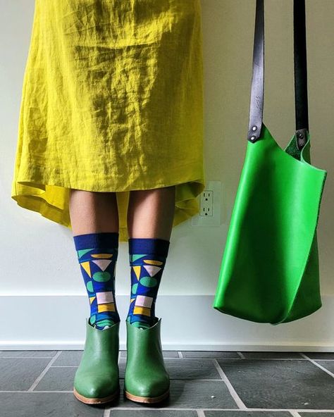 Dee Dee on Instagram: "One of my very favorite things about this account is finding small, ethical, and unique businesses to share with you... @tribal.joy is a perfect example! They created these incredible socks, made from bamboo fibers, developed and manufactured in Africa. They were designed by Bonolo Chepape - a young designer from South Africa. The name of the sock I'm wearing is Made of Many, showcasing the complexity of African Identities. I have a few more designs I'll be showcasing o Green Leather Bag, Vintage Gold Necklace, Dee Dee, Fresh Lime, Long Shorts, Leather Wedges, Green Leather, Leather Jewelry, Bag Straps