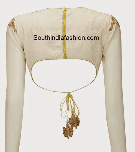 Boat neck full sleeves blouse featuring zari embroidery over the shoulders and a small key hole detail on one side. It has contrast show buttons and tassels on the back. Related PostsMirror Work Full Sleeves BlouseBoat neck Embroidered BlouseBlack Sequins Boat Neck BlouseBoat Neck Gold Brocade Blouse Full Sleeve Blouse Designs Back Side, Full Sleeves Blouse, Blouse Neck Patterns, Blouse Tassels, Bajirao Mastani, Choli Blouse, Full Sleeve Blouse, Brocade Blouse, Boat Neck Blouse