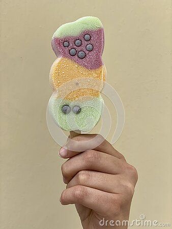 Creative composition for summer concept with a young girl hand holding a multi colored ice cream Hand Holding Popsicle Reference, Holding Popsicle Reference, Holding Ice Cream Reference, Holding Ice Cream, Creative Composition, Girl Hand, Drawing Stuff, Hand Holding, Tshirt Design