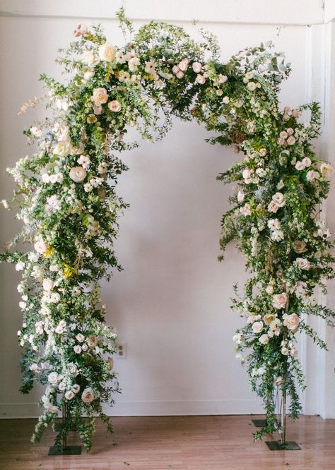 Featuring Japanese flowers from Naniwa Flower Auction, Kaylee designs a beautiful floral arch. The structure is created using a lovely arch from Danner & Soli, which she attached foam cages using zip ties before placing the flowers into place. Archways are perfect for setting the tone of a truly romantic wedding ceremony and this design surely accomplishes that in spades! Featured flowers: spirea, ranunculus, butterfly ranunculus, acacia foliage, eucalyptus, and roses. Ranunculus Butterfly, Butterfly Ranunculus, Wedding Guest Book Ideas, Guest Book Ideas, Fall Wedding Color Palette, Romantic Wedding Ceremony, Wedding Shower Decorations, Memorable Wedding, Wedding Invitations Romantic