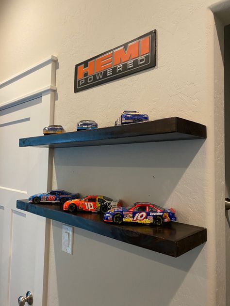 Car Bedroom Ideas For Men, Car Lover Room Ideas, F1 Shelf, Jdm Car Room Decor, Car Guy Bedroom Aesthetic, Car Room Decor Men, Car Guy Room Ideas, Car Guy Room, Guy Bedroom Aesthetic