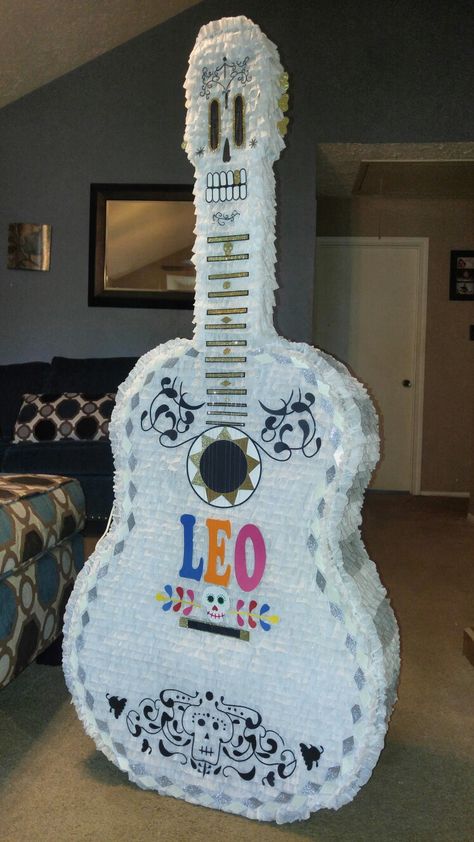 Coco guitar piñata Coco Pinata, Coco Guitar, Coco Birthday, Coco Party, Coco Disney, Minion Birthday Cake, Mexican Birthday Parties, Construction Theme Party, Piñata Ideas