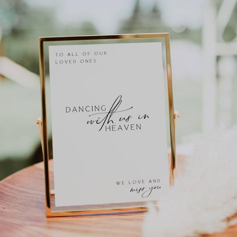 Remember your loved ones in a special way with our "Dancing With Us in Heaven" sign. This loving memory table sign is perfect for weddings, allowing you to honor those who are no longer with us but forever dancing in heaven. Our editable sign features a heartfelt message that will bring comfort and warmth to your celebration. Light a candle and let their presence be felt as you commemorate them with this beautiful in memory sign. Include this touching heaven wedding sign in your wedding signage Those In Heaven Wedding Sign, Lost Loved Ones Wedding Memory Table, Wedding Memory Wall, Memorial Table Sign Wedding, Wedding Remembering Loved Ones, Memory Table Wedding Display, In Memory Table, Loved Ones In Heaven Wedding, Heaven Wedding Sign