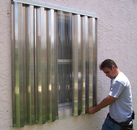 Protect your Windows | Time of Tempest |17 Trouble-Free Ways To Have A Storm-Proof House Shutters For Sliding Glass Doors, Storm Shutters, Accordion Shutters, Metal Shutters, Window Protection, Wireless Home Security Systems, Safe Room, Sliding Glass Doors, Survival Life