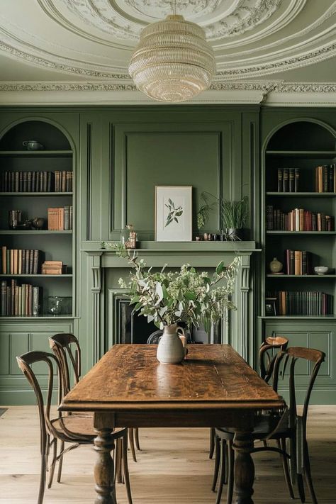 Green Dining Room With Fireplace, Green Wall Wood Trim, Dining Room With Green Walls, Green Dining Room With Wainscoting, Green Paneled Walls, Green Black Wood Dining Room, Moss Green Dining Room, Green Kitchen Dining Room, Olive Green Dining Room Walls