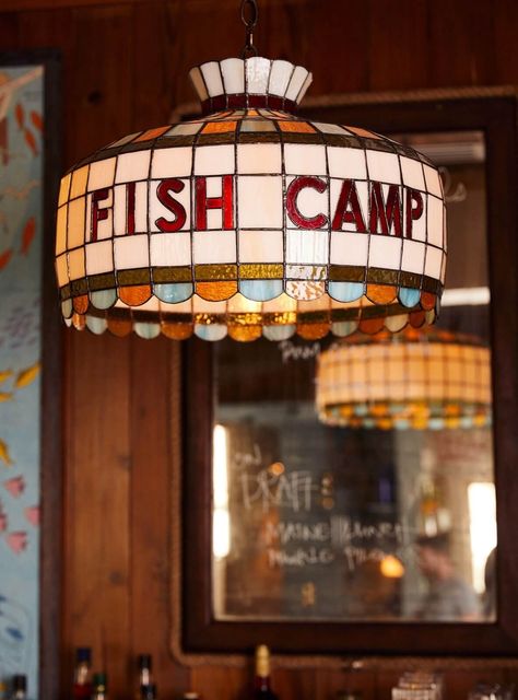 Sullivan’s Fish Camp - SDCO Partners Sullivans Fish Camp, Fish Store Aesthetic, Gemini Logo, Nautical Gallery Wall, Wyoming Ranch, Eclectic Restaurant, Bait Shop, Lake Theme, Seaside Restaurant