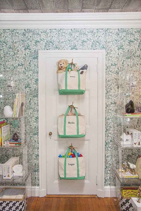 Use tote bags in place of toy bins. | 49 Clever Storage Solutions For Living With Kids Creative Toy Storage, Kids Bedroom Storage, Decorating Hacks, Diy Toy Storage, Toy Storage Solutions, Small Nurseries, Nursery Storage, Stuffed Animal Storage, Clever Storage Solutions