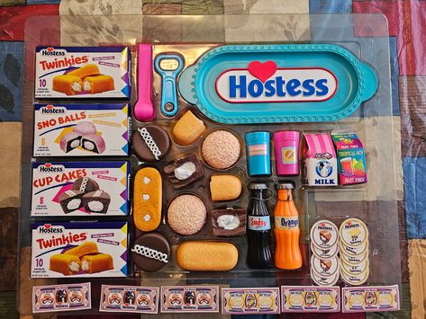 Very rare Hostess Bake Shop realistic food play set, including Hostess brand "money," paper and coins, bottle opener, tongs, tray, milk, juice, cups, soda bottles, mini boxes of Twinkies, Snowballs, and Cup Cakes.  New, never played with, only removed to inspect them. If you are a fan of Hostess bakery, Twinkies, Snowballs or their snack cakes this is a fun collectible.  The original box is gone, but included are both the top and bottom molded to fit plastic trays. Outstanding condition! Fake Food Toys, Realistic Play Food, My Life Doll Accessories, Money Paper, Hostess Cupcakes, Mini Boxes, Snack Cakes, Miniture Food, Kids Toy Shop